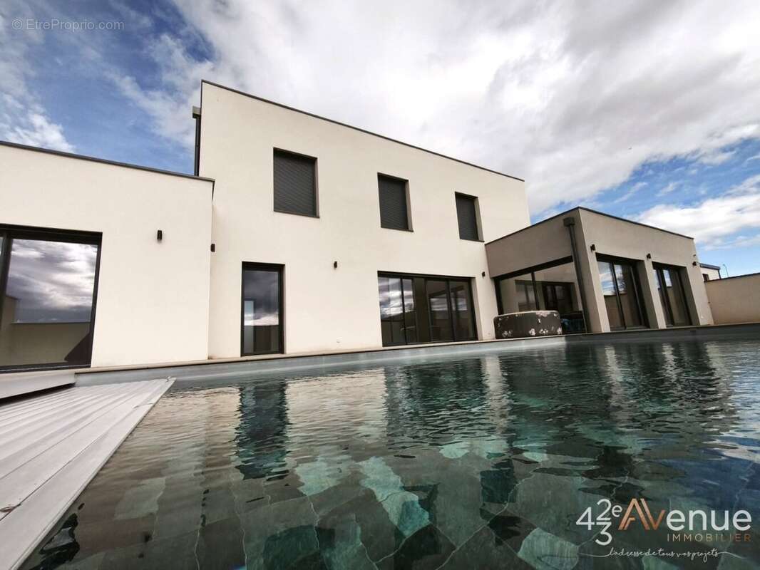 Maison à ANDREZIEUX-BOUTHEON