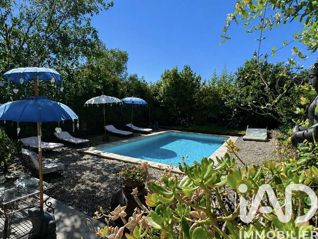 Photo 3 - Maison à SAINT-JULIEN-DE-PEYROLAS