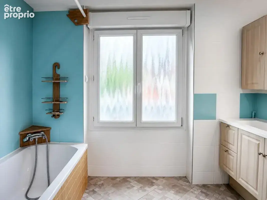 Maison de 7 pièces de 130 m² à Fleury-les-Aubrais - photo 8
