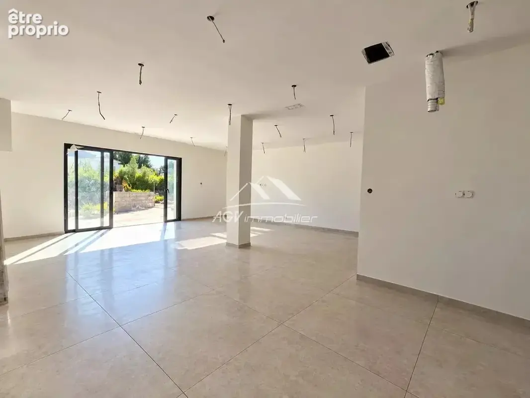 A Saint-Julien-Les-Rosiers, maison neuve d'environ 106 m² avec piscine - photo 3