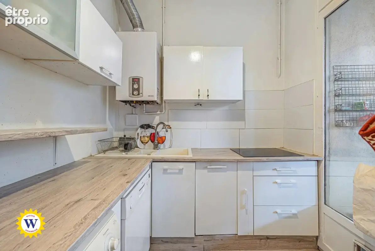 Appartement familial avec terrasse à rénover, proche gare et tram - photo 4