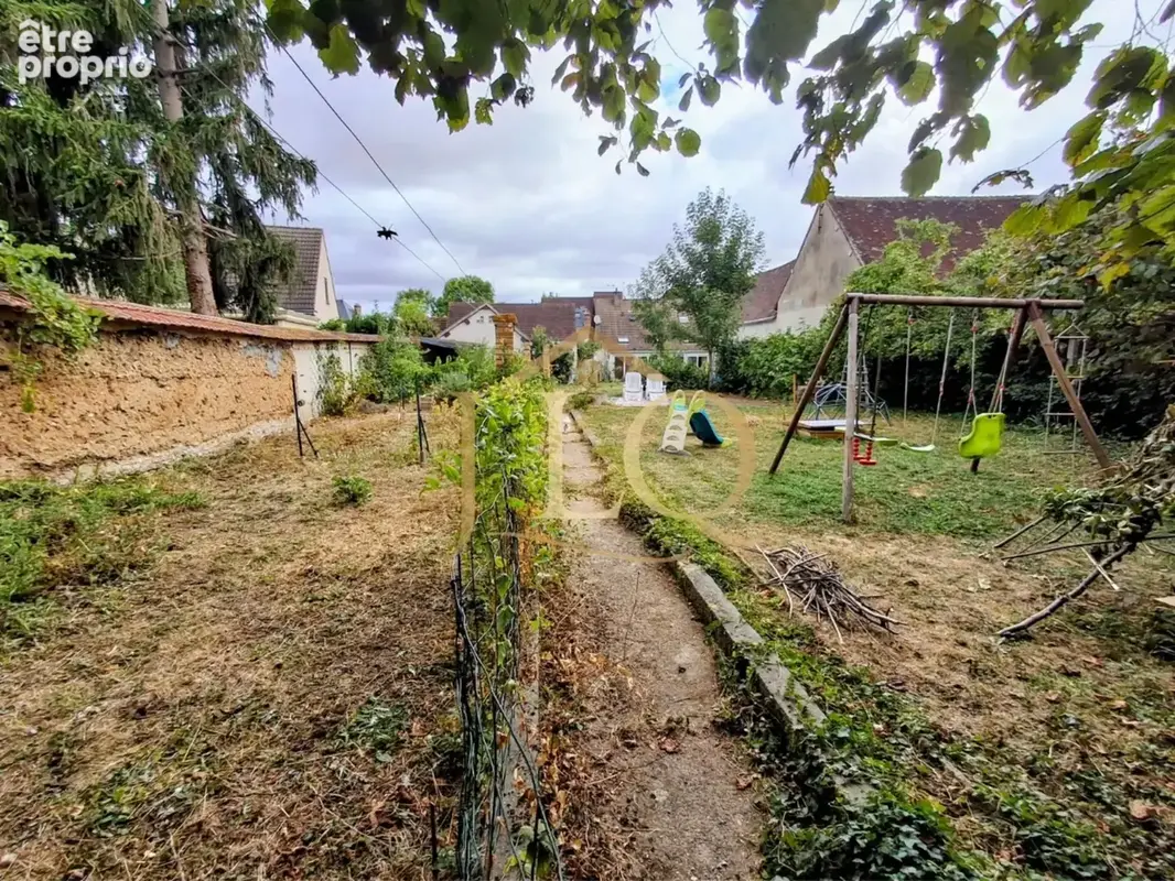 La Pierrotine - Maison familiale de ville de 170m² environ - 4 chambres - Terrain de plus de 1 000m² - Pierres (28 130) - photo 16
