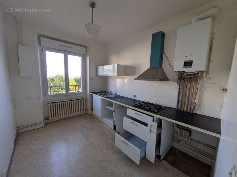 Lorient appartement de 66 m² habitable a rafraichir de type 3 a proximité du centre ville et de la rocade - photo 4