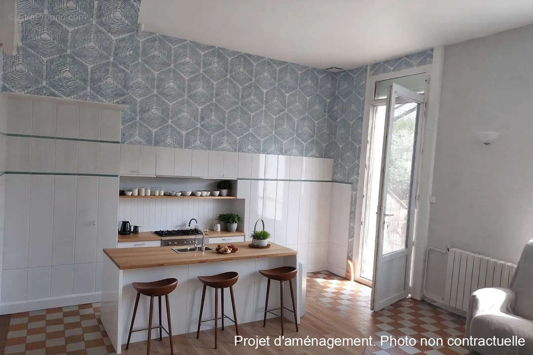 Maison à YVRE-L'EVEQUE