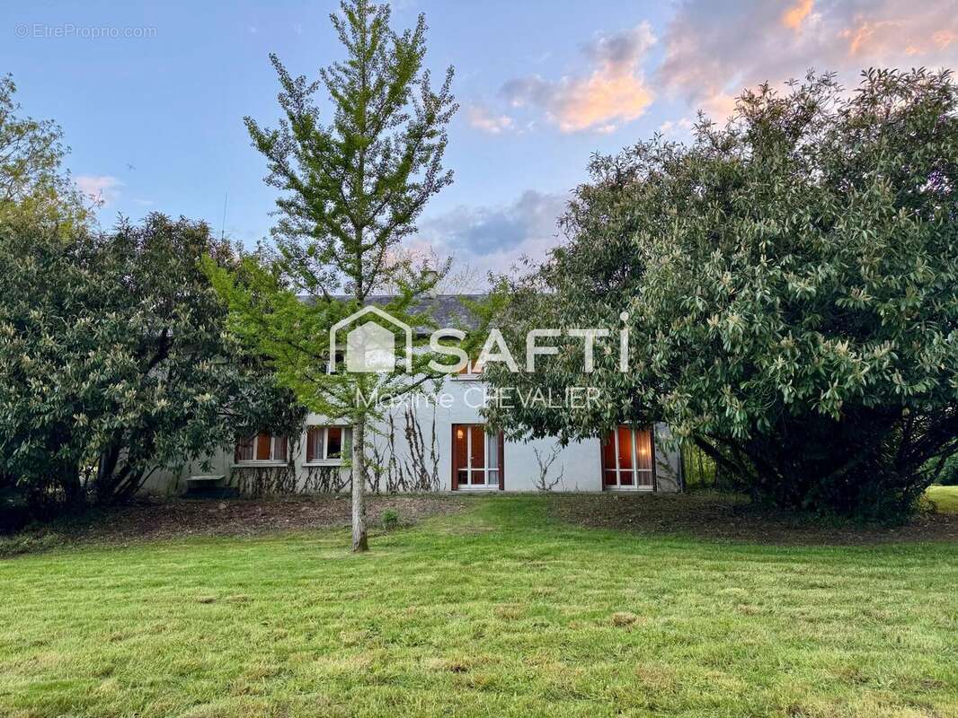 Photo 2 - Maison à NEUVY-SAINT-SEPULCHRE