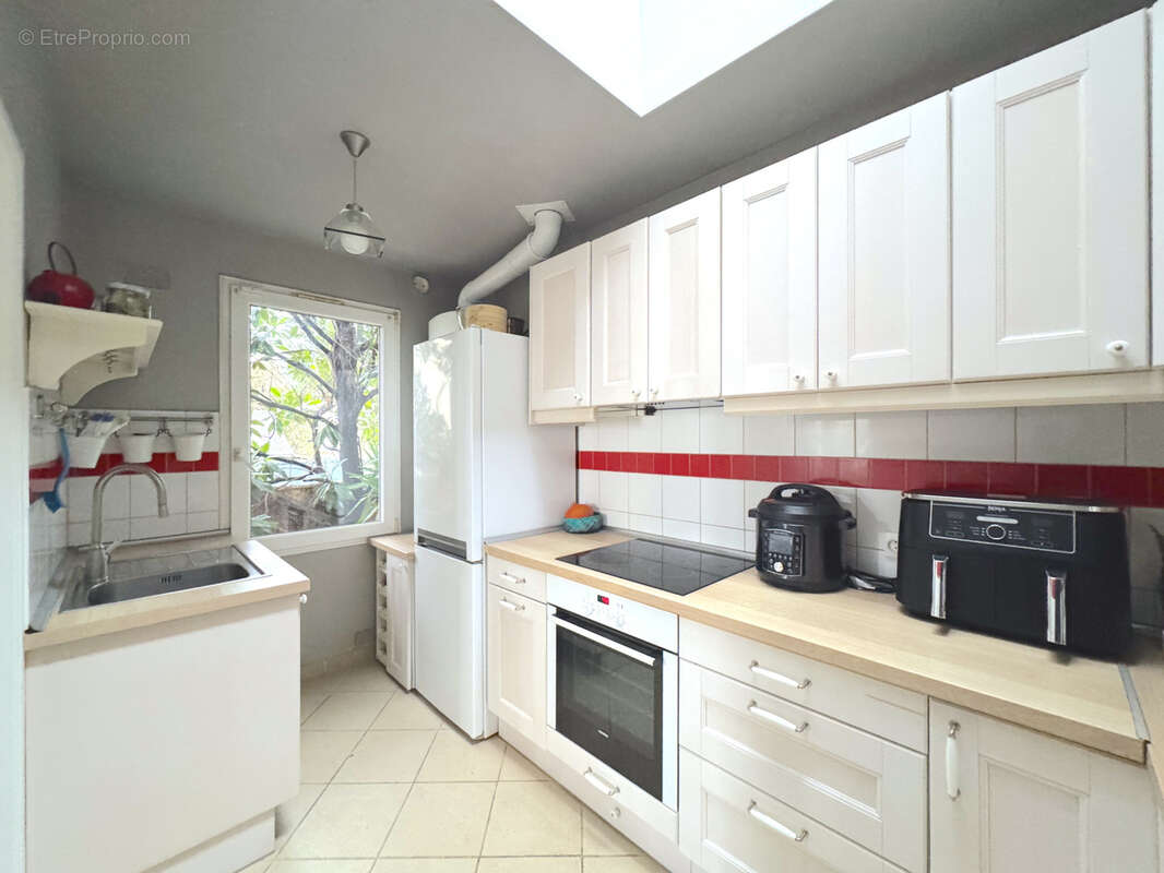 Maison à COURBEVOIE