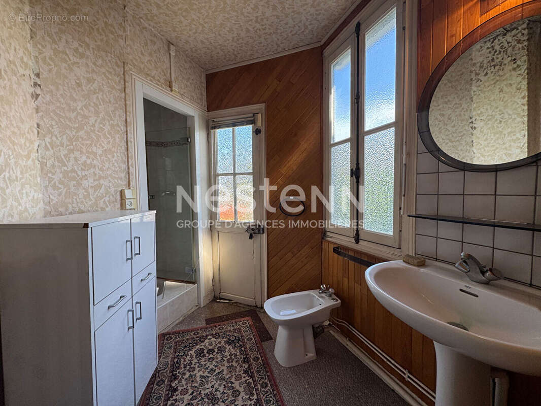 Proche Centre-Ville : Maison de 155m² 4 chambres avec jardin et cave - photo 10