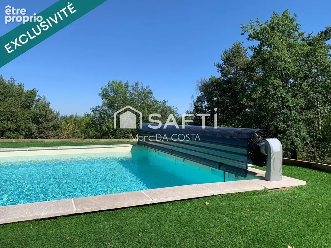 Photo 1 - Maison à ECOTAY-L'OLME
