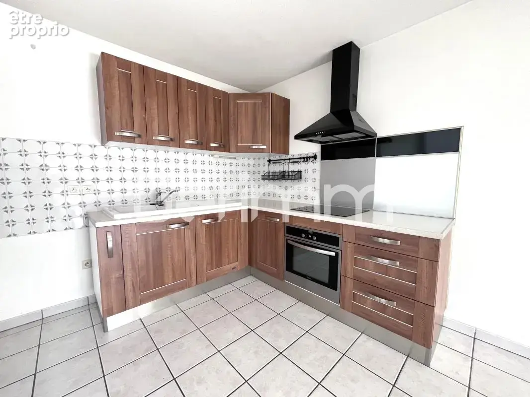 Vente - Appartement - 2 pièces + cuisine - 59 m² - 199 000 € - - photo 2