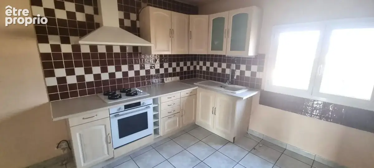Grande maison familiale ou 2 appartements sur terrain d'environ 13 ares - photo 12
