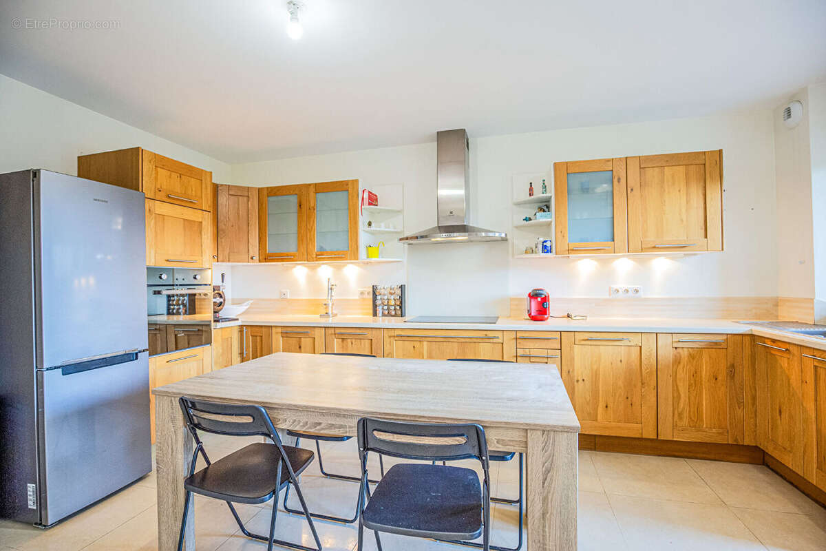 Agence immobiliere laforet - exclusivite - "cyprès" - poisy - appartement rez-de-jardin t3 de 63,66m² - cave - place privative c - photo 6