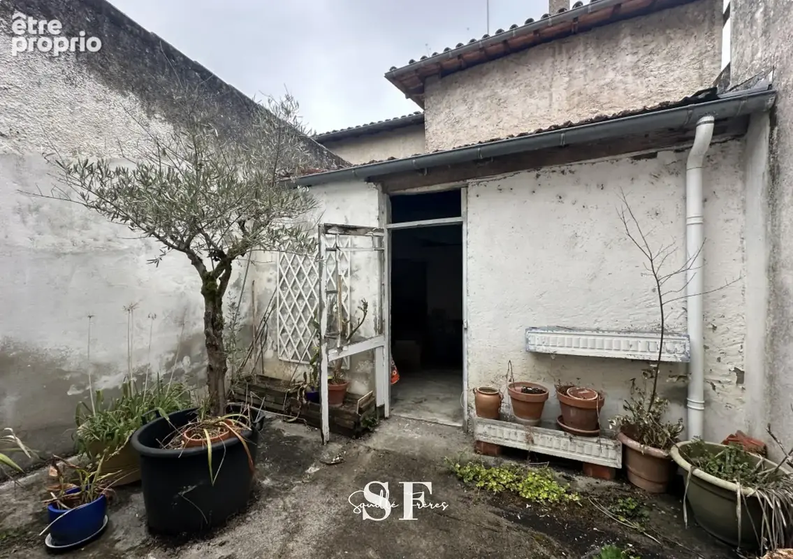 RIVE GAUCHE - Maison de village avec garage et cour proche commodités - photo 3
