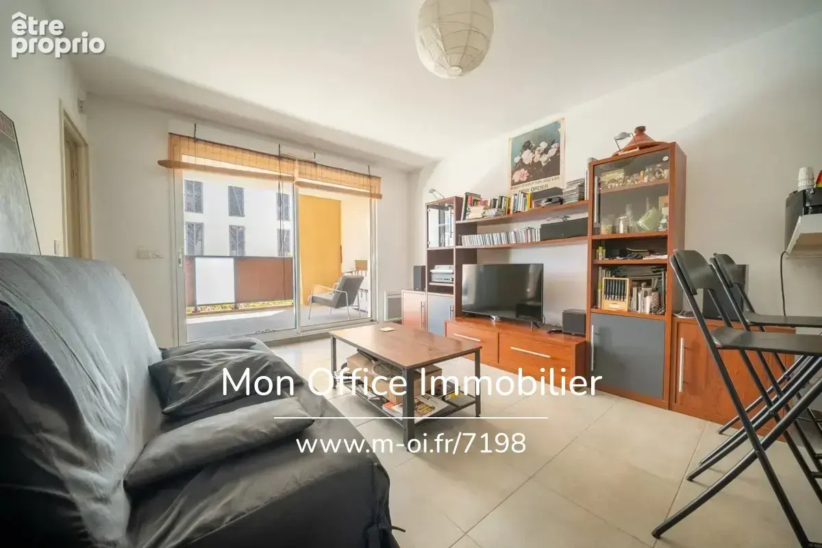 Référence : 7198-PAN - Appartement 2 pièces de 45 m² avec terrasse et garage - photo 4