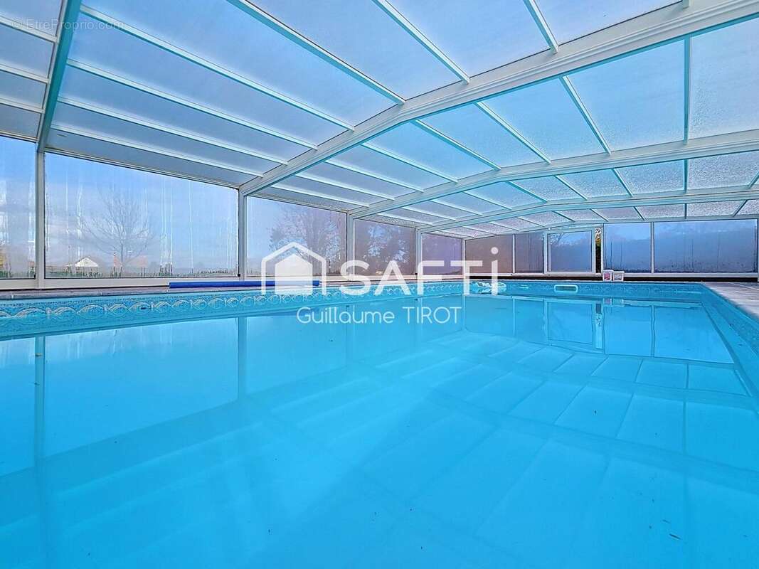 Photo 2 - Maison à SAINT-REMY-EN-ROLLAT