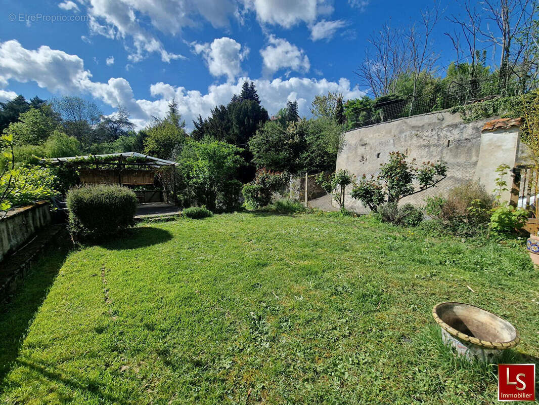 Maison à RENAISON