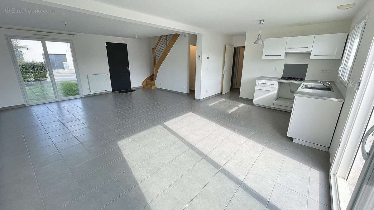 Salon - séjour vue 3 - Maison à SAINT-ARMEL