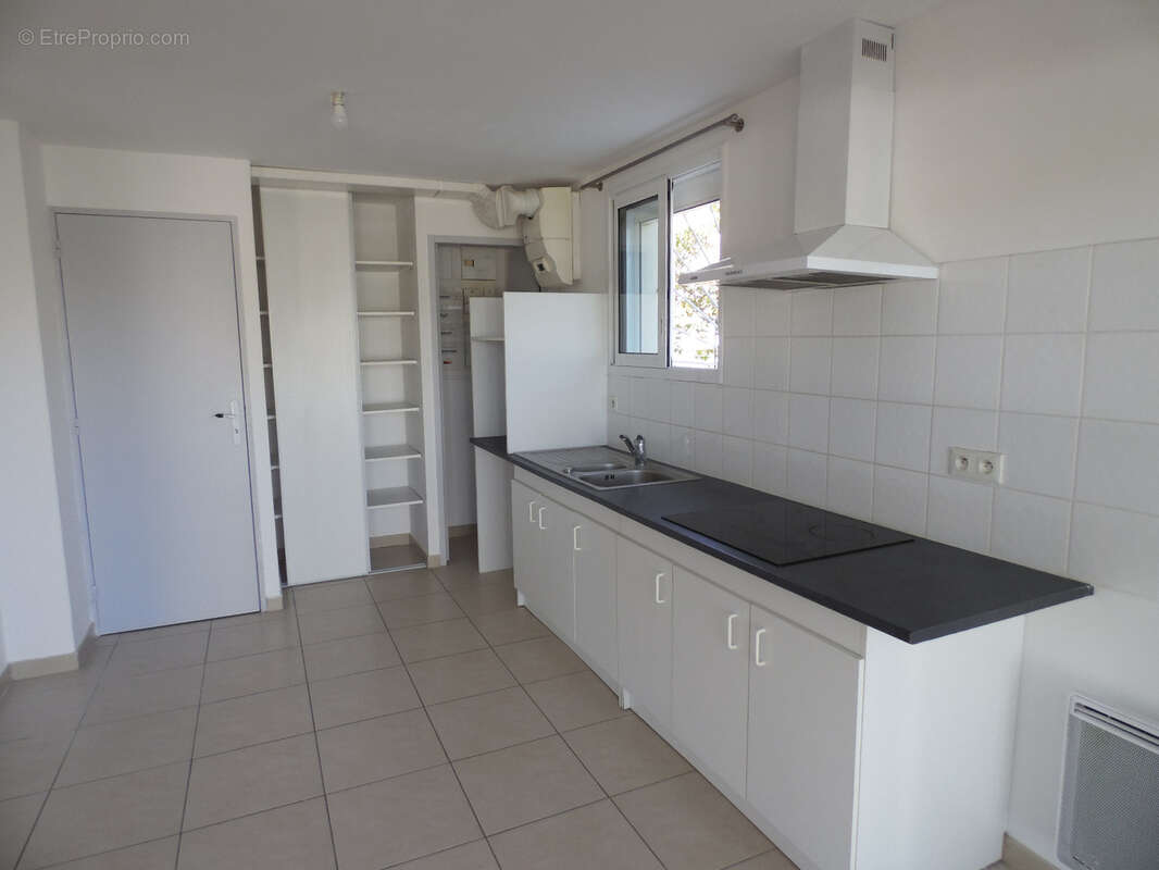 Maison à LAUDUN-L&#039;ARDOISE