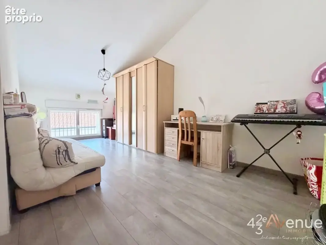 Appartement 4 pièces 90 m² à vendre à Saint-Etienne (42000) - photo 5
