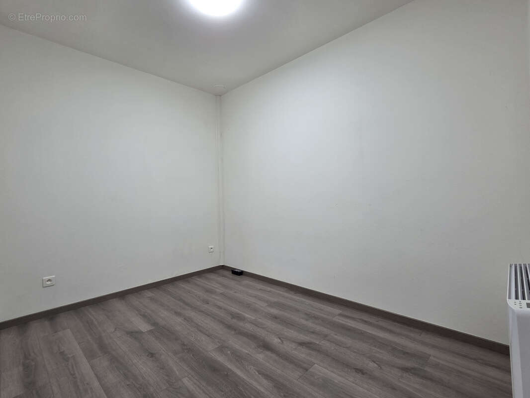 Ensemble immobilier d'habitations et de commerces - photo 6