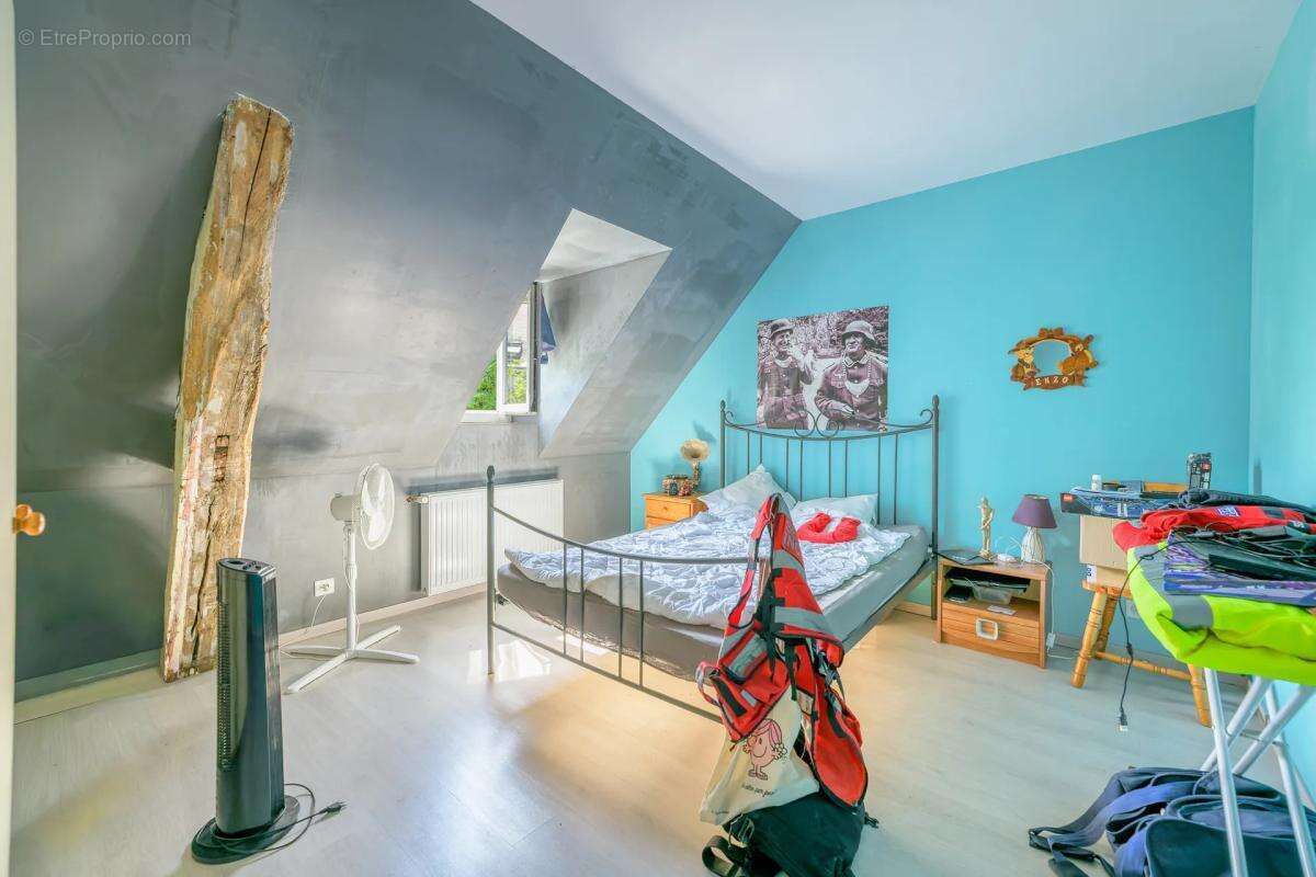 Maison de 5 pièces de 102 m² à Villechauve - photo 12