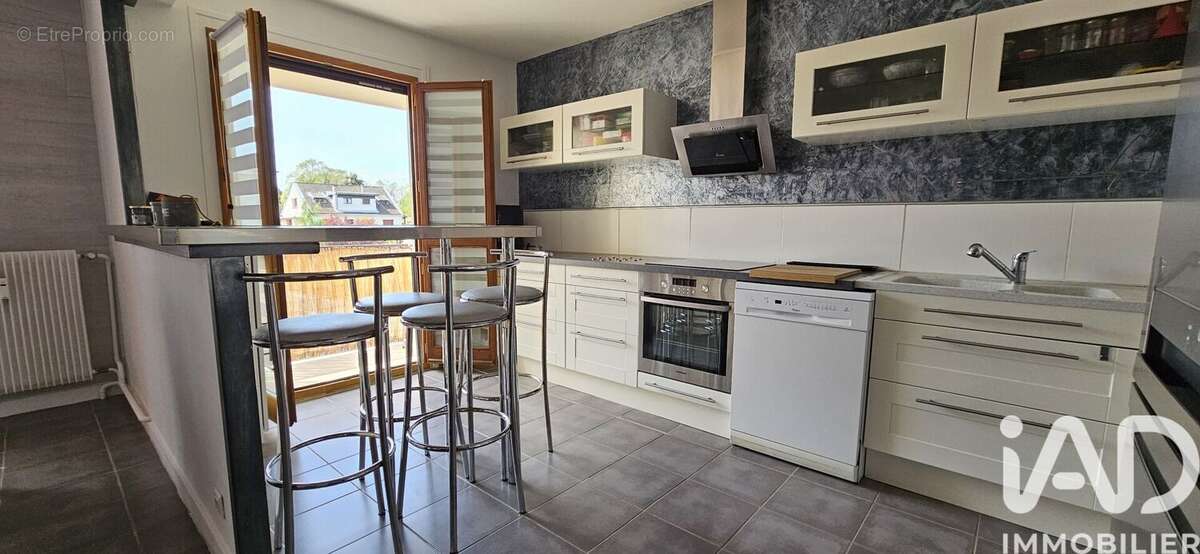 Photo 2 - Appartement à SAINT-GENEST-LERPT