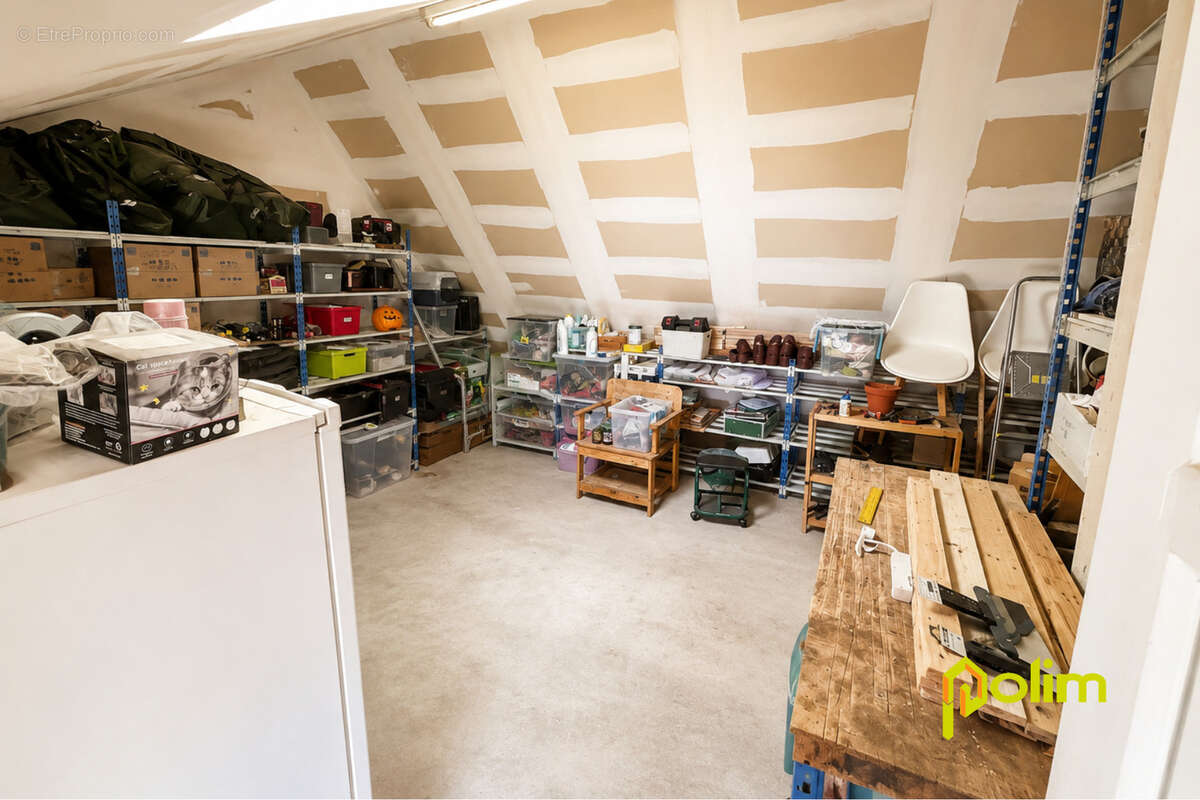 Ensemble immobilier avec appartement loué et vaste dépôt - photo 10