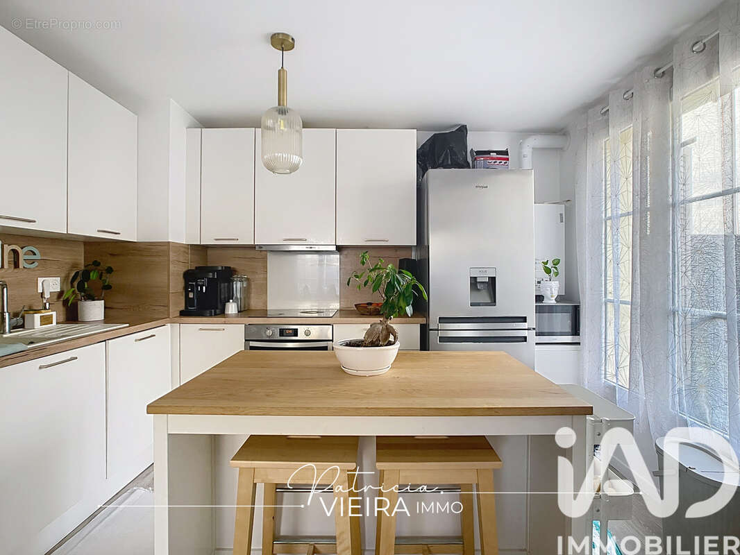 Photo 3 - Appartement à CHEVRY-COSSIGNY