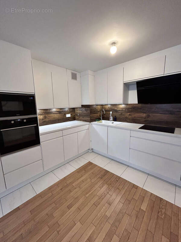 Photo 3 - Appartement à VOISINS-LE-BRETONNEUX