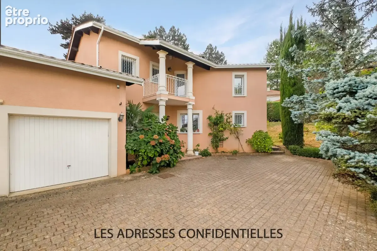 Champagne Au Mont D'or - Maison familiale - 226.50 m2 - sur grand parc arboré - photo 17