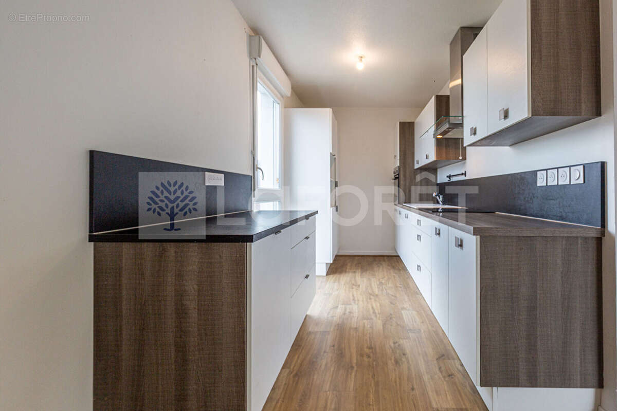Agence immobiliere laforet - "carex" - annecy - seynod - appartement traversant t3 de 68m² - cave - balcon - photo 5