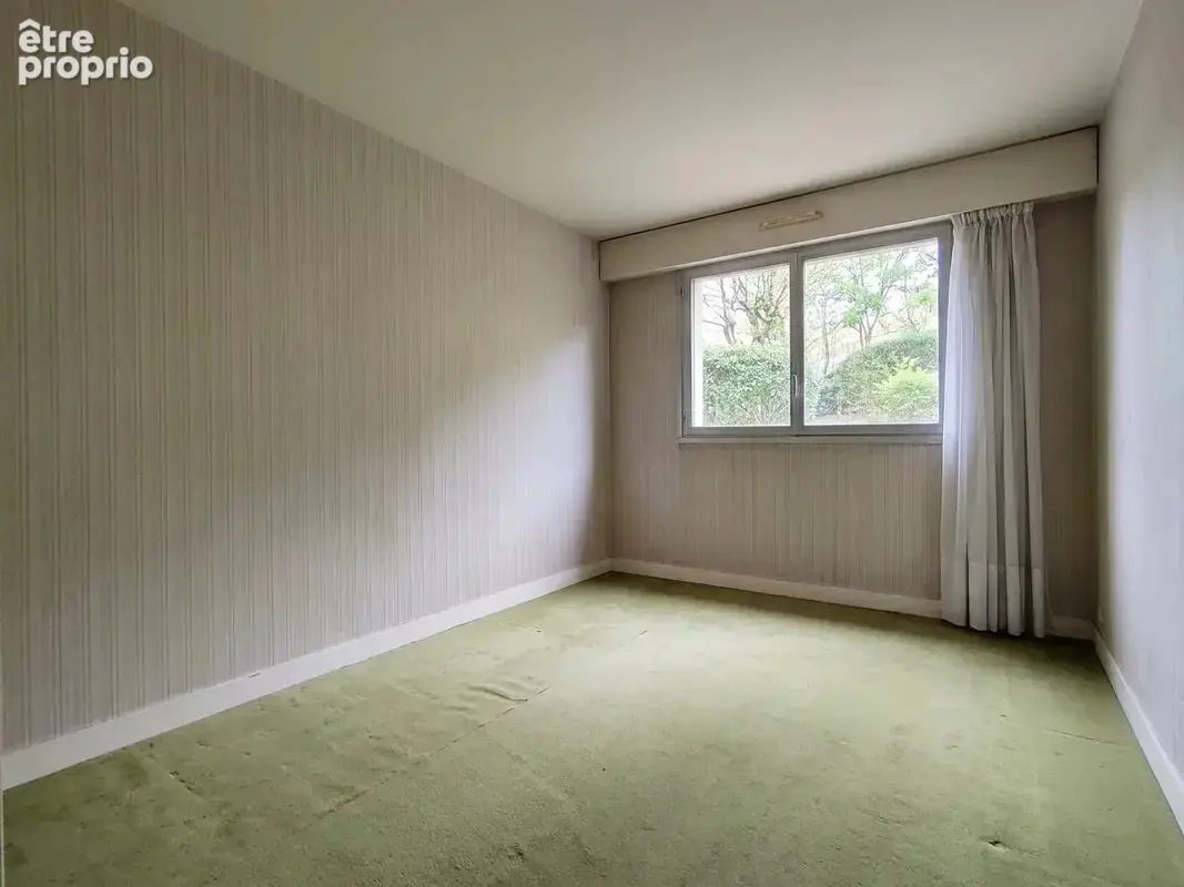Appartement avec jardin privatif, caves et parking - photo 12
