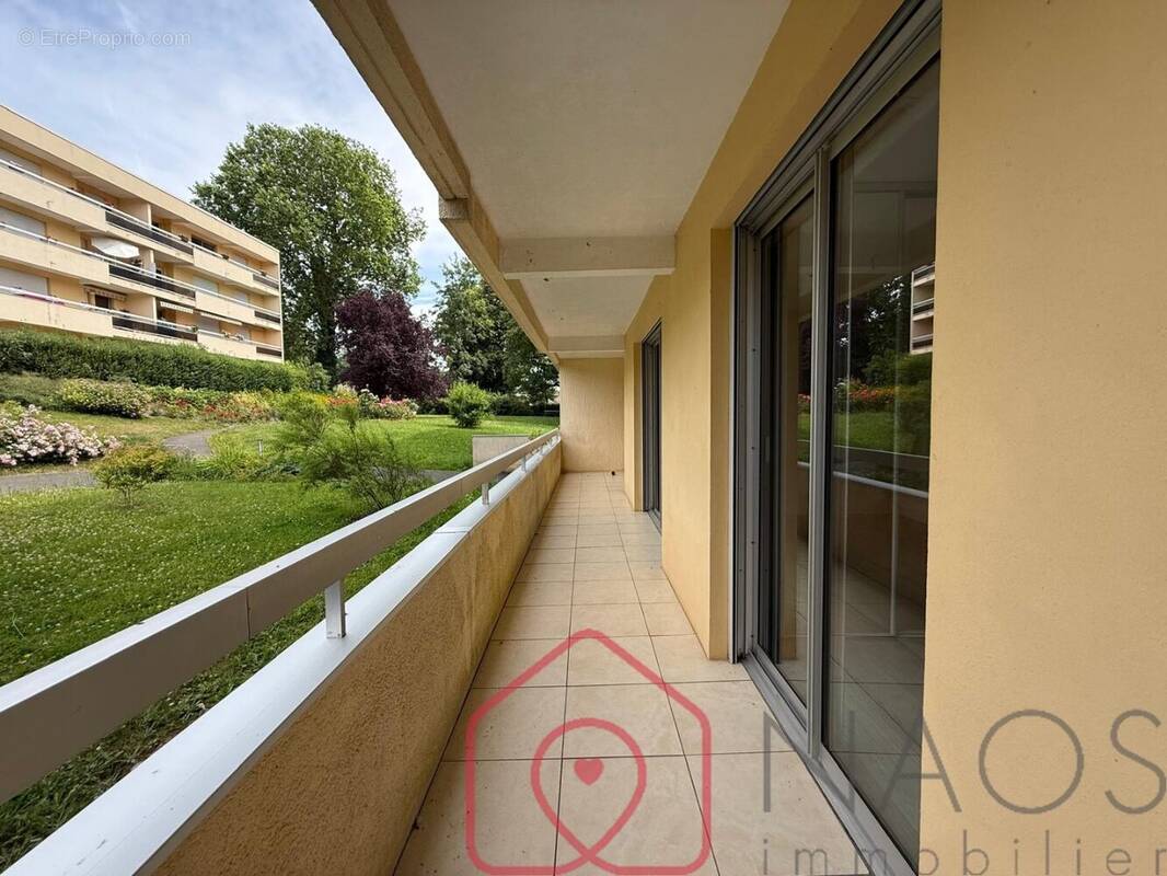 Appartement t2 en rez-de-chaussée avec balcon filant, cave et stationnements - photo 1