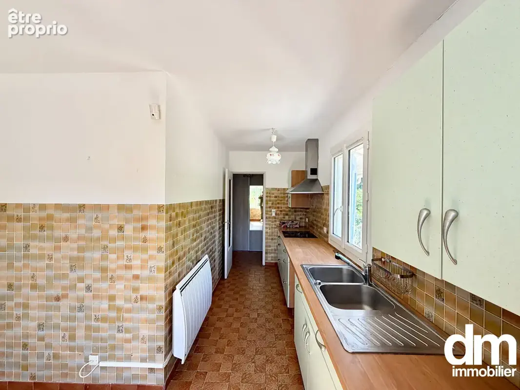 Maison de type 5 avec dépendance sur une parcelle de 570m2 - photo 10