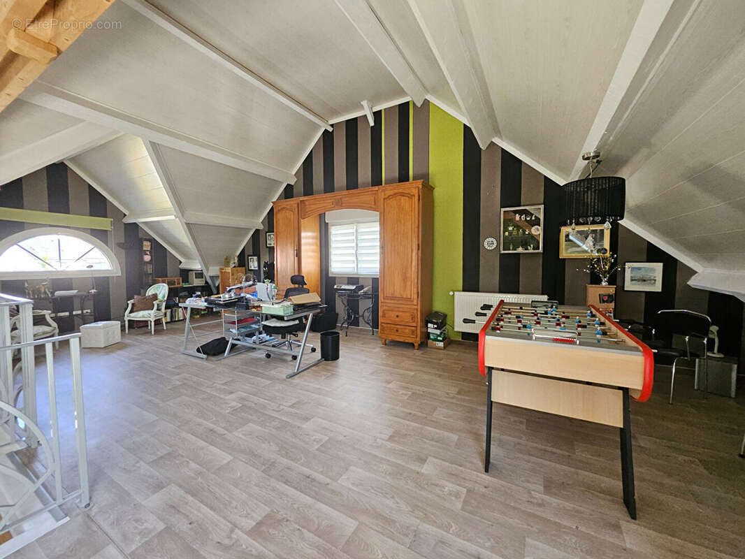 Maison d'exception à Vendre à Rivery - Un Écrin de Prestige de 200 m² - photo 12