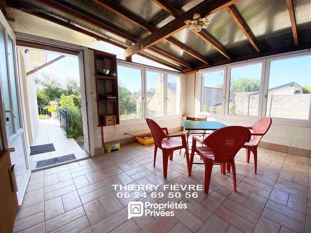 A VENDRE MONTREUIL BELLAY 49260 Maison de 151 m2  4 chambres sur terrain clos avec véranda cave - photo 12