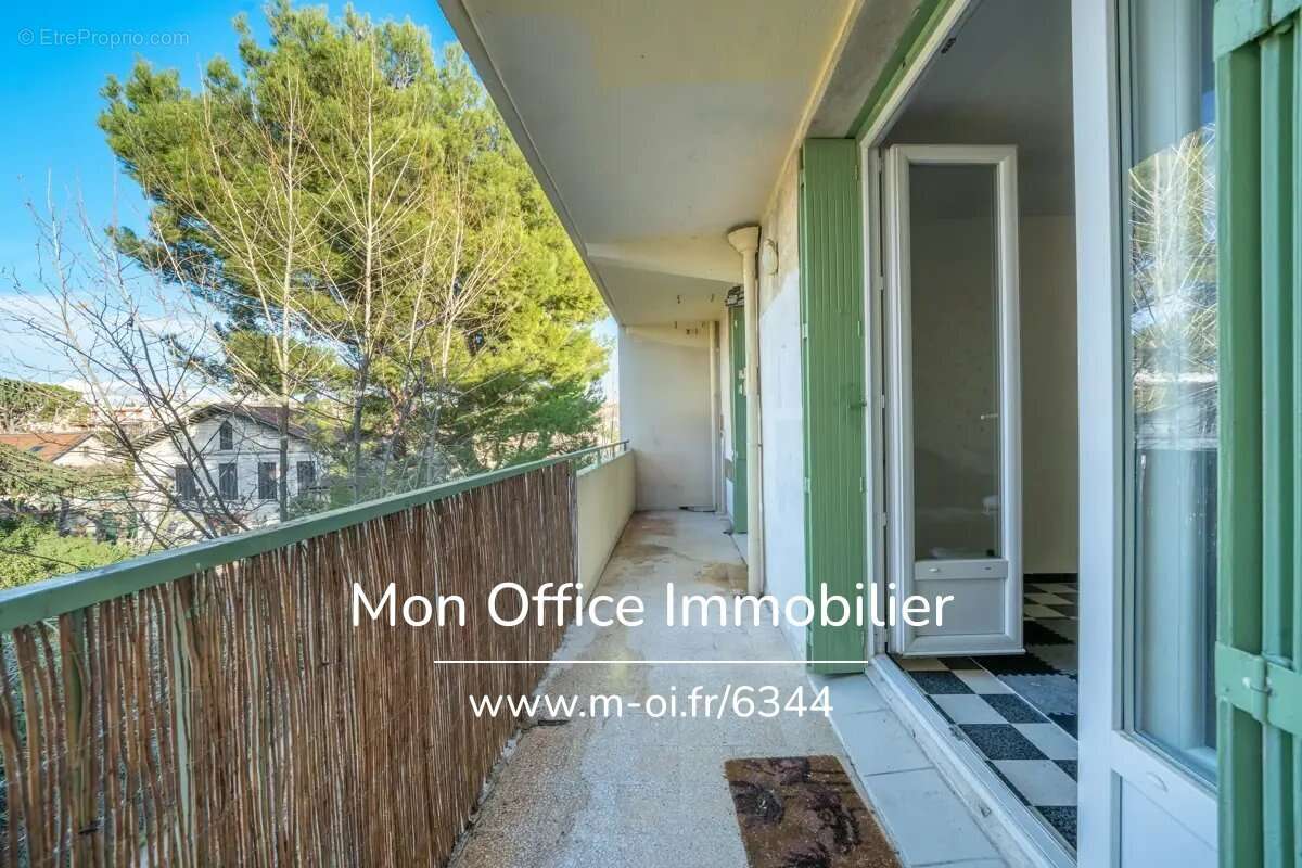 Référence : 6344-MCO - Exclusivité Appartement 1/2  pièces d'une surface de 35 m2 au dernier étage plus parking privatif et cave - photo 6