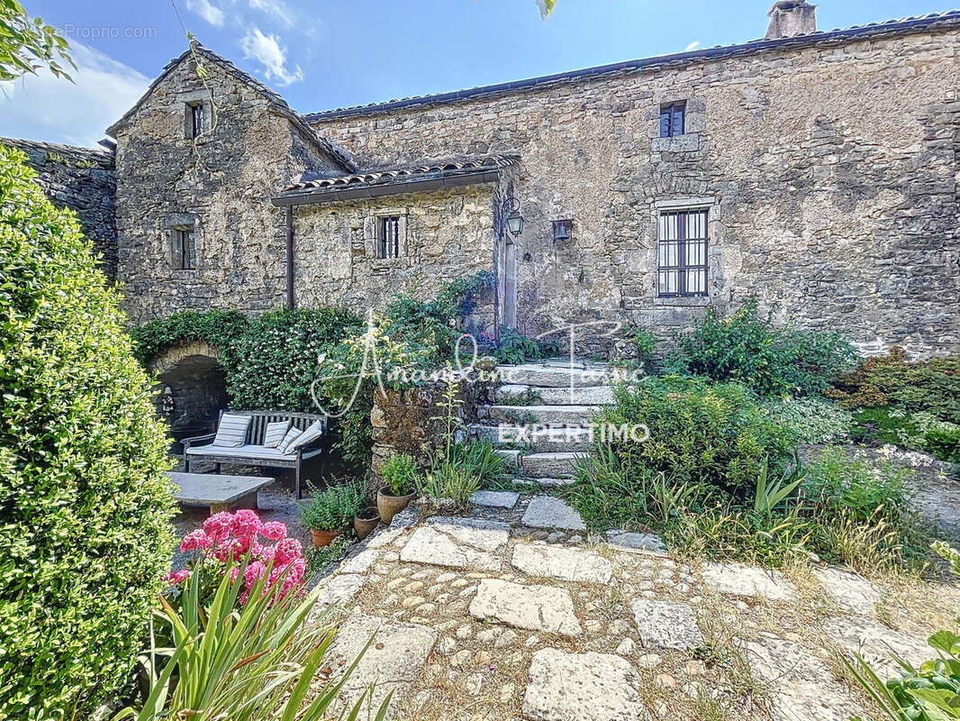 À vendre   Ancien prieuré du XIVe siècle entièrement rénové   Larzac, charme et autonomie - photo 32