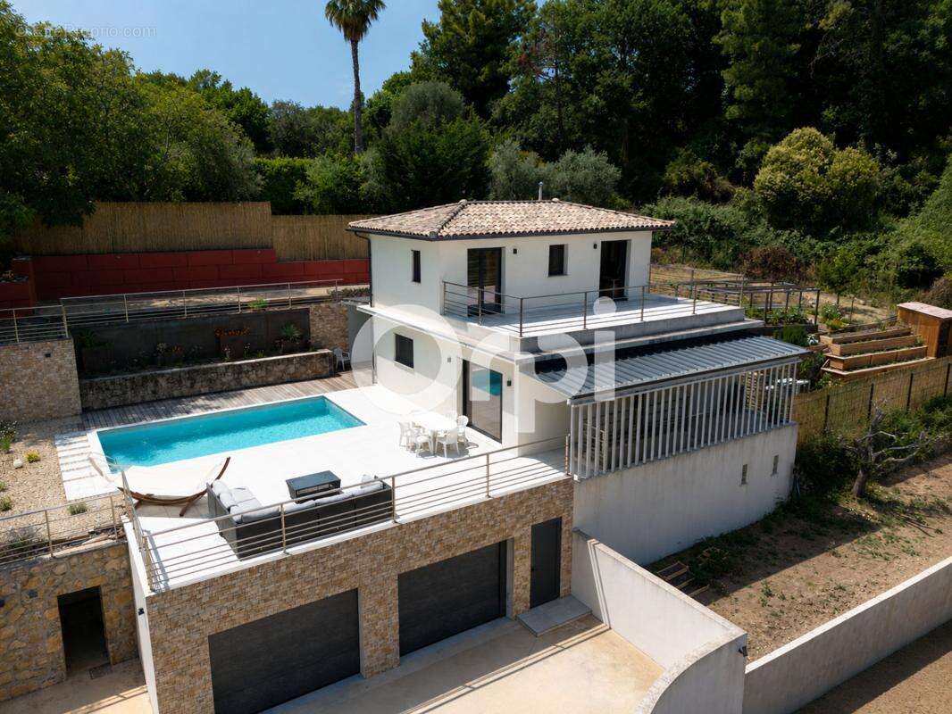 Maison moderne -piscine -vue dégagée - double garage - proche commodités - photo 2
