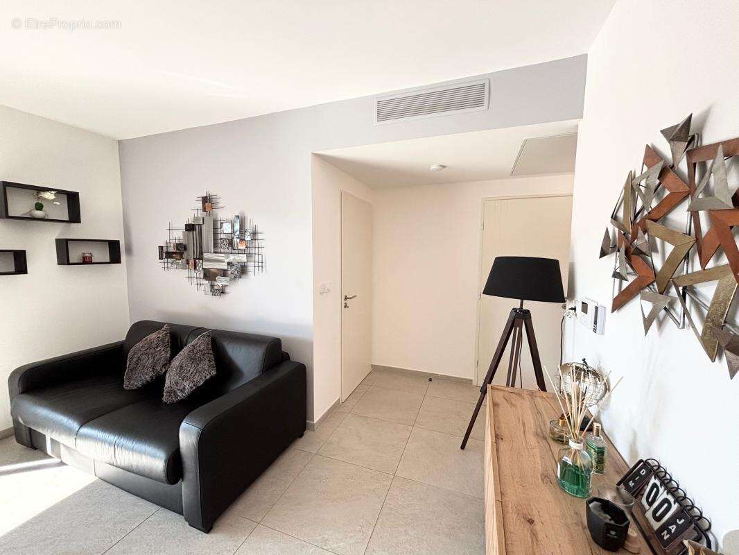 Appartement f2 avec terrasse et parking privatif a vendre résidence les terrasses de la mer - photo 8