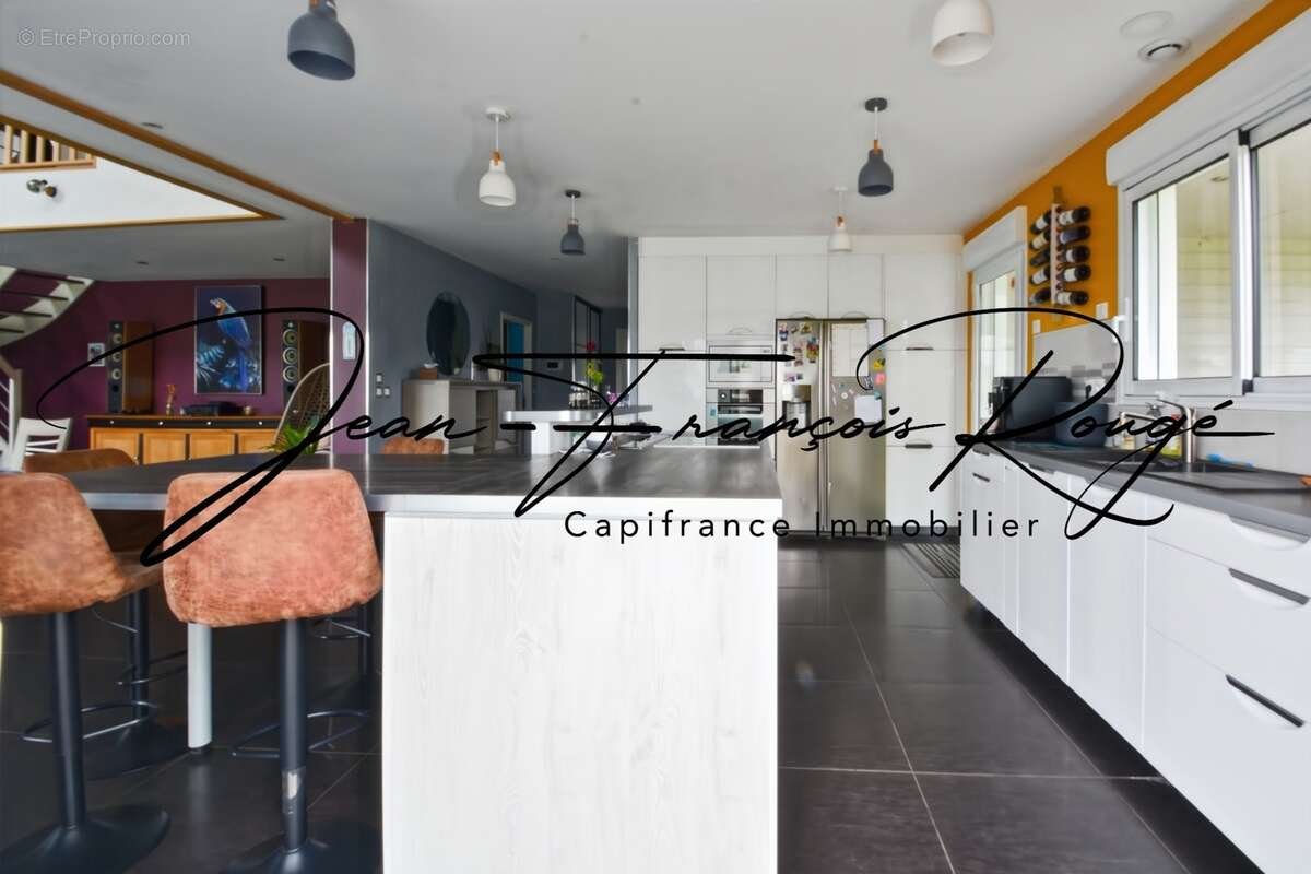 Magnifique plain-pied de 200 m² proche des commerces à Marigny le Lozon !!! - photo 8