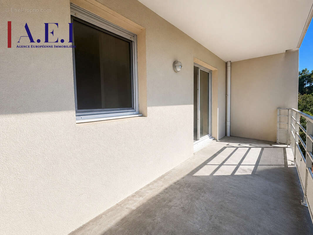 Appartement T2 avec terrasse et stationnement privatif - photo 2