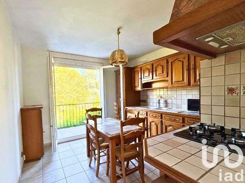 Photo 2 - Appartement à ANDREZIEUX-BOUTHEON