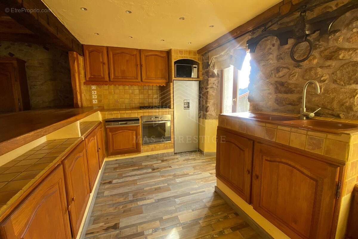 Maison à COUSTOUGES