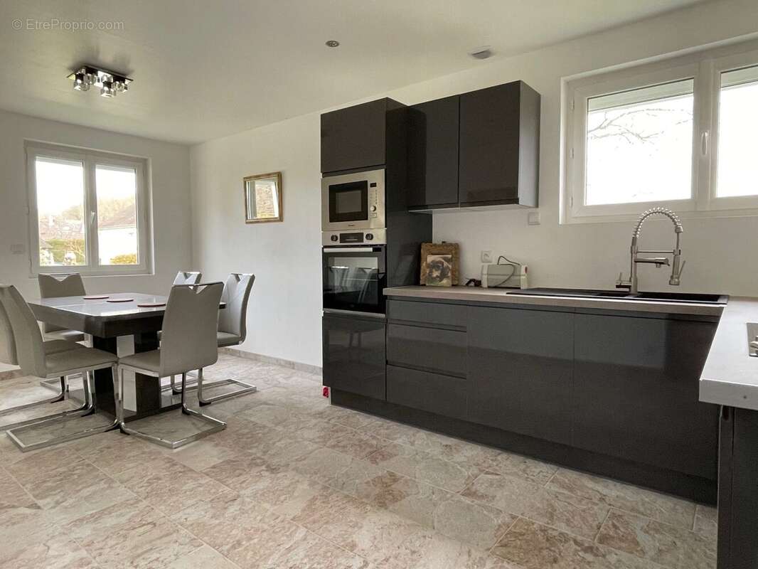 Maison 85 m² à Beaumont-Le-Roger  - photo 6