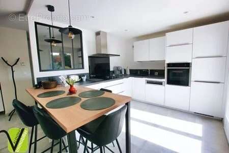 Maison - 128m ² - photo 7