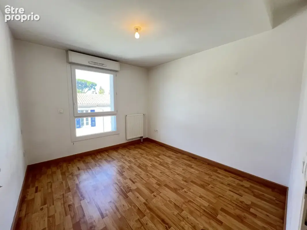 Appartement T3 - 69m2 + garage - Proche Place Napoléon LA ROCHE SUR YON - photo 6