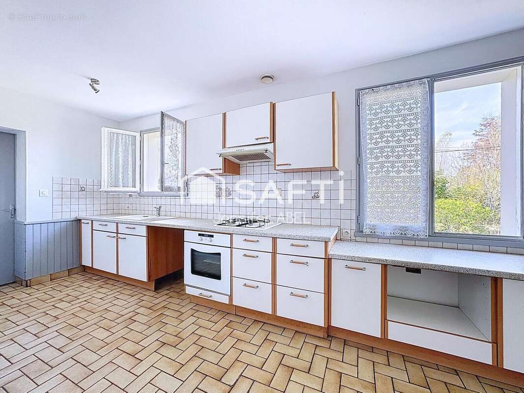 Photo 3 - Maison à LA CHAPELLE-SAINT-LAURENT