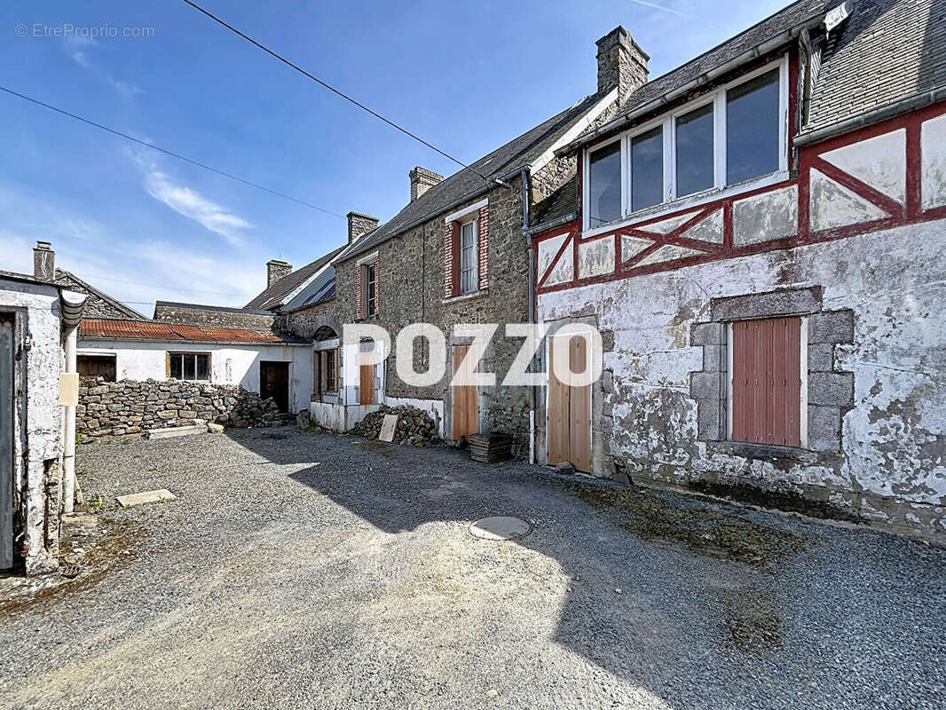 Maison à AGON-COUTAINVILLE