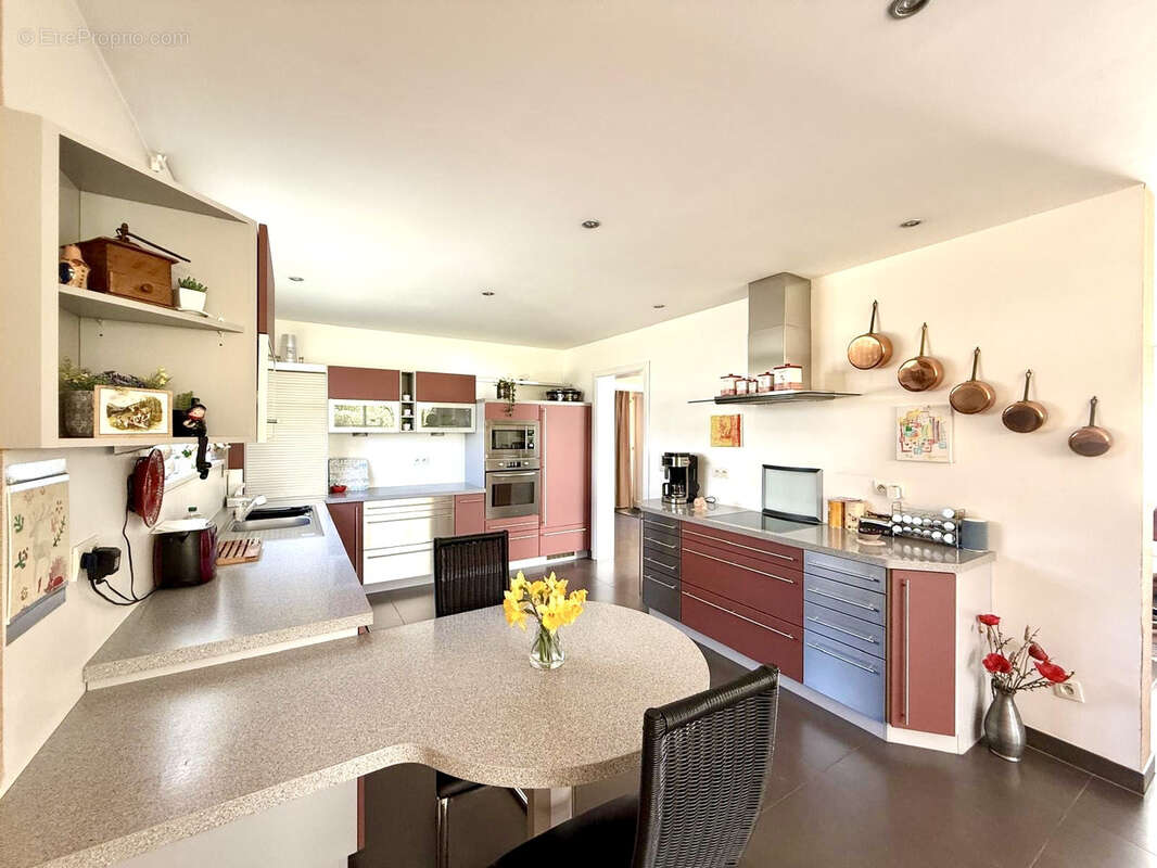 Berstett - L’esprit maison dans une petite copropriété   5 pièces de 141,63 m2 avec jardin, terrasse, garage - photo 9