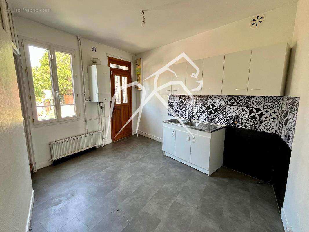 Maison mitoyenne avec 3 chambres, jardin et cave  83 m²  LE-PETIT-QUEVILLY - photo 2